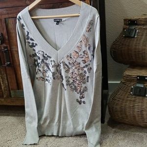 Sweater with sequined embellishments